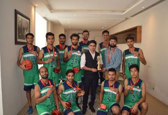 Dhruv Galgotia with boys basketball team